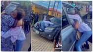 Lady graduates from the university, mother brings gifts and sprays her money in excitement