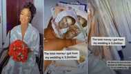 "They sprayed me N3.2 million": Nigerian bride flaunts wads of cash friends, family gave her during wedding