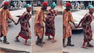 Elderly couple melts hearts, shows true love exists as wife guides visually Impaired husband on road