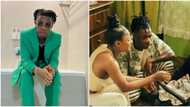 "Is our Joeboy now a daddy?" Singer sparks speculations as he shares photo of woman and baby