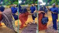 "Marry good woman o": Wife lays her wrapper on floor for husband to walk on, receives cash in video