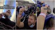 "Everyone looked up": Man does giveaway inside an aeroplane, gives lucky lady N20k cash in viral video