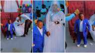 "The bride is not happy": Video of pretty tall lady getting wedded to short man stirs mixed reactions