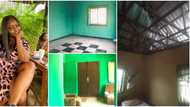 Young Nigerian lady shares photos as she finally completes father's house with her savings after many years