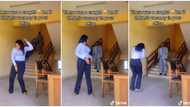 Pretty Nigerian lady in long sleeves shows off sweet dance moves at office, her male boss catches her in video
