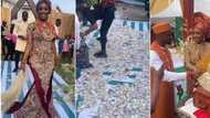 "God answered my prayers": Bride rejoices on wedding day as guests spray huge wads of cash on her