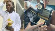 Singer Burna Boy beams with excitement as he receives a customised Grammy wristwatch, shares video