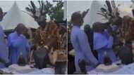 Obi Cubana: Video captures traditionalist spraying money on a reverend father in Oba, stirs massive reactions