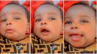 She go sabi pretend: Cute baby girl switches from sad to happy mode as she heard her crush is around in video
