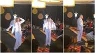 Grandpa shows stuff he's made of, goes on runway like model in video, people scream as he spins