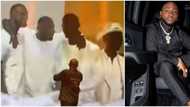 Davido pays emotional tribute to late crew members, TJ, Obama, Fortune, and DJ Olu at concert