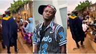 Akoi help: Portable wears big agbada, shares money to roadside beggars on Friday morning in emotional video