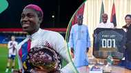 Asisat Oshoala presents CAF's Female African Player of the Years trophy to President Tinubu and wife