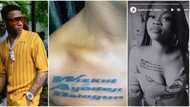 “Tacha did it better”: Wizkid’s fan boldly tattoos singer’s full name on her chest, viral photos cause stir