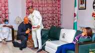 Photo emerges as PDP governor’s preferred successor kneels before him, Nigerians react