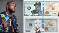 Nigerians react as Davido prays for man who made street art of him to mark birthday (photos)