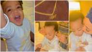 Regina Daniels gifts son Munir customized gold necklace in adorable video