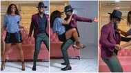 Energy woman: 50-year-old Kate Henshaw effortlessly jumps on young man as she dances Salsa with him