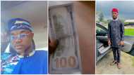 Excited Nigerian Student Shows off Dollar Landlord Gave Him, Stirs Reactions