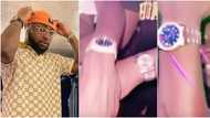 Davido's crew members dance for joy as singer gifts them luxury wristwatches (video)