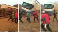 No be juju be dat? Nigerians surprised after 5 men pull up fallen lorry with rope, video goes viral