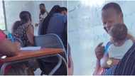 Lecturer helps female student who is a nursing mother to carry her baby during class, video goes viral