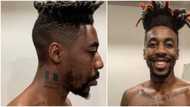 Very unnecessary: Mixed reactions as Canadian rapper Dax tattoos Nigerian flag on his neck