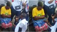 Emotional moment Nigerian youths donate N500k to old woman selling groundnut at protest ground (photos)