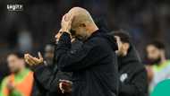 Pep Guardiola reacts after Man City loses 1-0 to Aston Villa at Villa Park