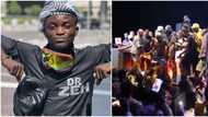 "The shoe go dey smell": Many react as Portable gives out shoes to lucky fan while performing on stage