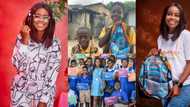 Kind young lady stuns poor kids, gifts them school bags made from discarded pure water sachets