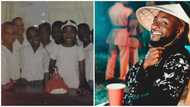 Singer Davido takes fans down memory lane, shares throwback photo with classmates