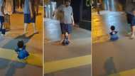 "I love her": Girl with small stature and unique walking step strolls down a street, steals hearts