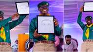 Best artist in UAR: Sanwo-Olu excited as he finally receives his funny-looking portrait from artist