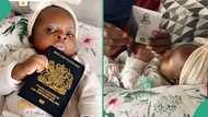 Newborn baby holds British passport that allows her to travel to 177 countries, her father rejoices