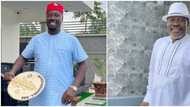 Obi Cubana makes the cross sign as Kanayo O. Kanayo rains crisp N500 notes on him, Nigerians react