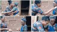 Sweet moment young lady visits woman who is over 100 years old, 'drags' her out and sprays cash in video
