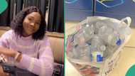 Lady living in UK recycles empty bottles of water, uses money she made to buy snacks