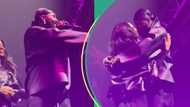 Kizz Daniel’s wife surprises him on stage at UK concert, fans go gaga as he reveals her name: “Aww”