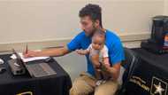 Dad goes viral after taking 3-month-old son along to army recruitment exam, writes test as he holds him