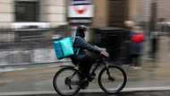 Deliveroo shares surge on 'profit milestone'