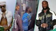 Rare video of Burna Boy and Wizkid looking tired as they leave a nightclub in the morning trends