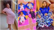 Nigerian woman with 5 newborn babies complains at night, kids play on the bed as they look at her