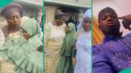 Nigerian bride bursts into tears, refuses to let go of mother on wedding day: "It's not easy"