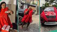 Nigerian woman over the moon as lover blesses her with dream car, video goes viral