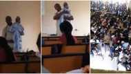 Reactions as Nigerian lecturer is recorded in video nursing his student's baby while giving lecture in class