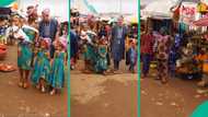 Video: Nigerian woman storms Akure market with her white husband and children, people go wild