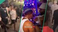 "Lagos traffic na ur mate": Video of Davido trekking due to 'go slow' to beach to join Wizkid trends