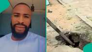 Brave Nigerian man exposes mysterious object he unearthed by roadside: "Evil world"