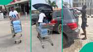 Nigerian man captured on camera using bottled water to wash his car, video gets attention